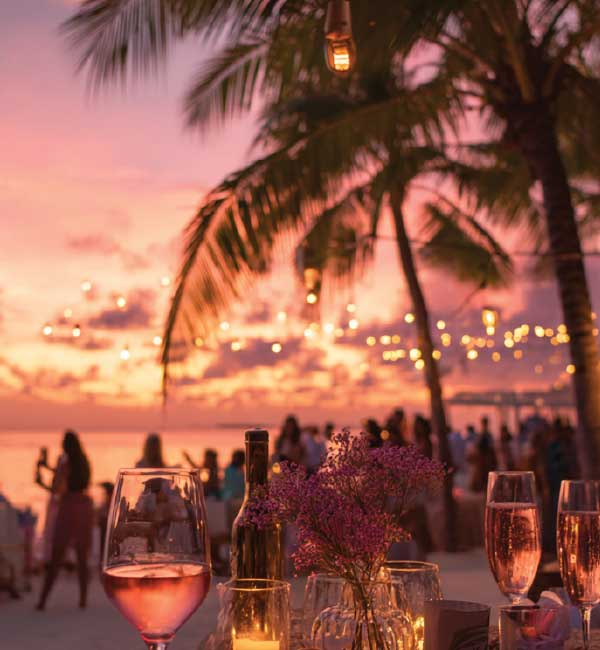 Sunset soirée with guests and ambient lights